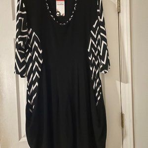 Black dress with white and black sleeves